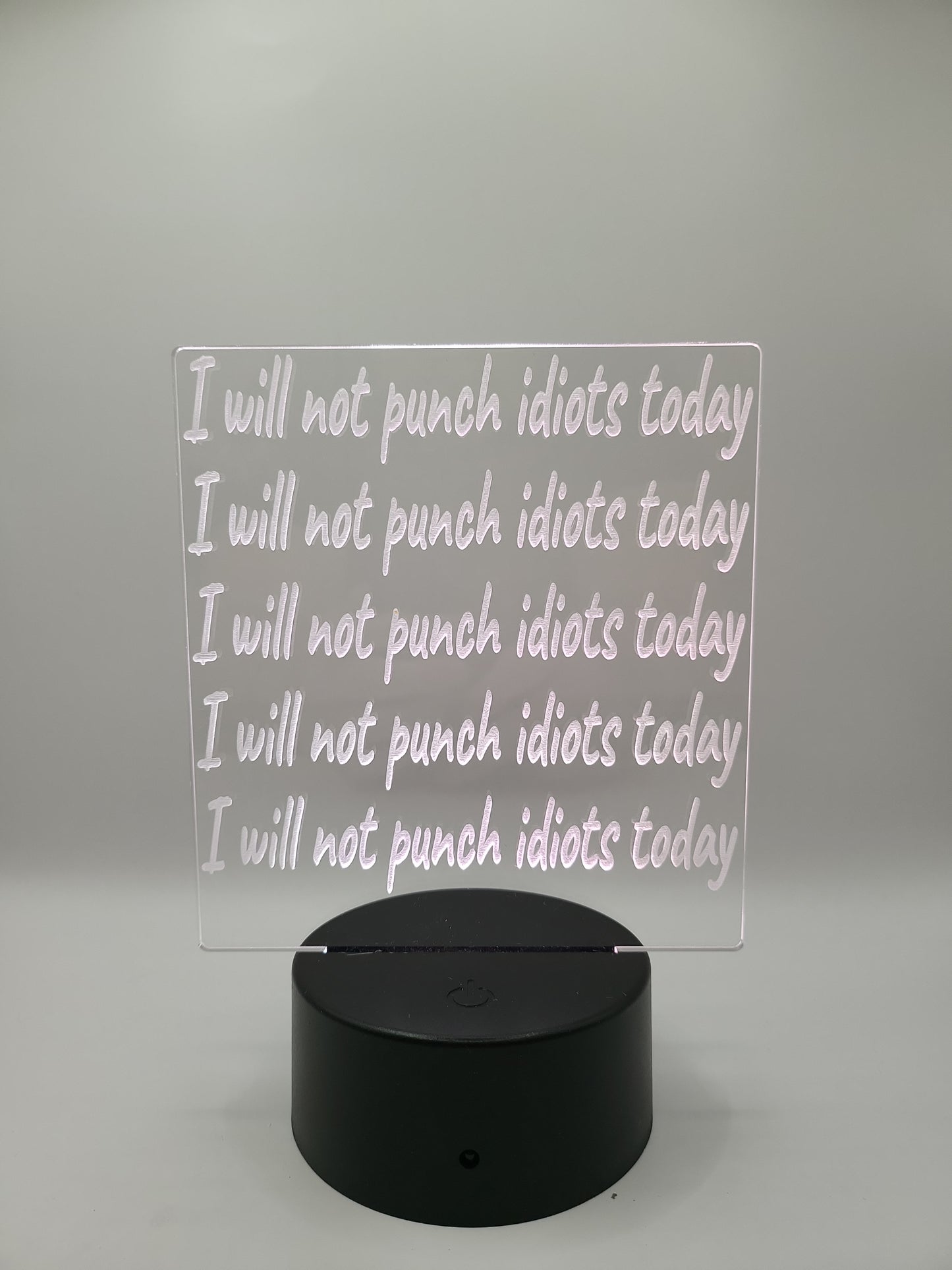 "I will not punch idiots today" acrylic sign with color changing base