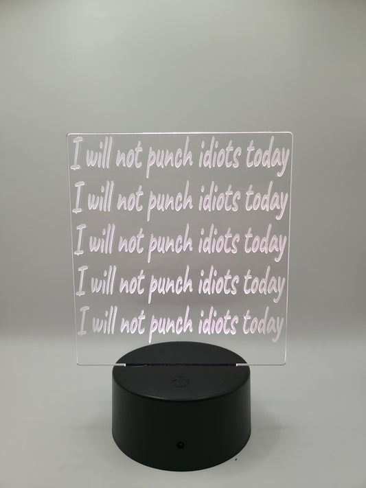 "I will not punch idiots today" acrylic sign with color changing base