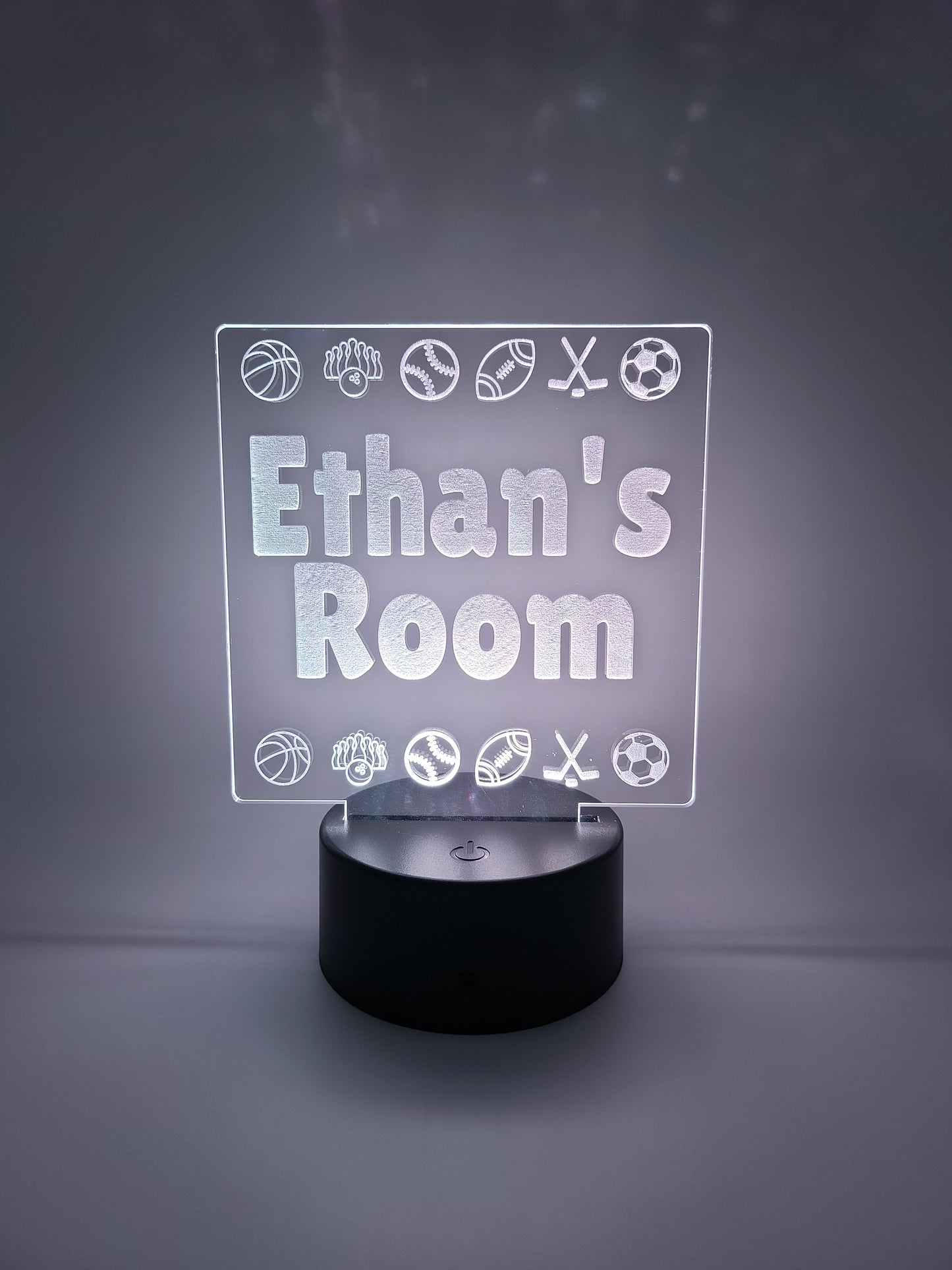 Personalized sports themed acrylic sign, with color-changing light base