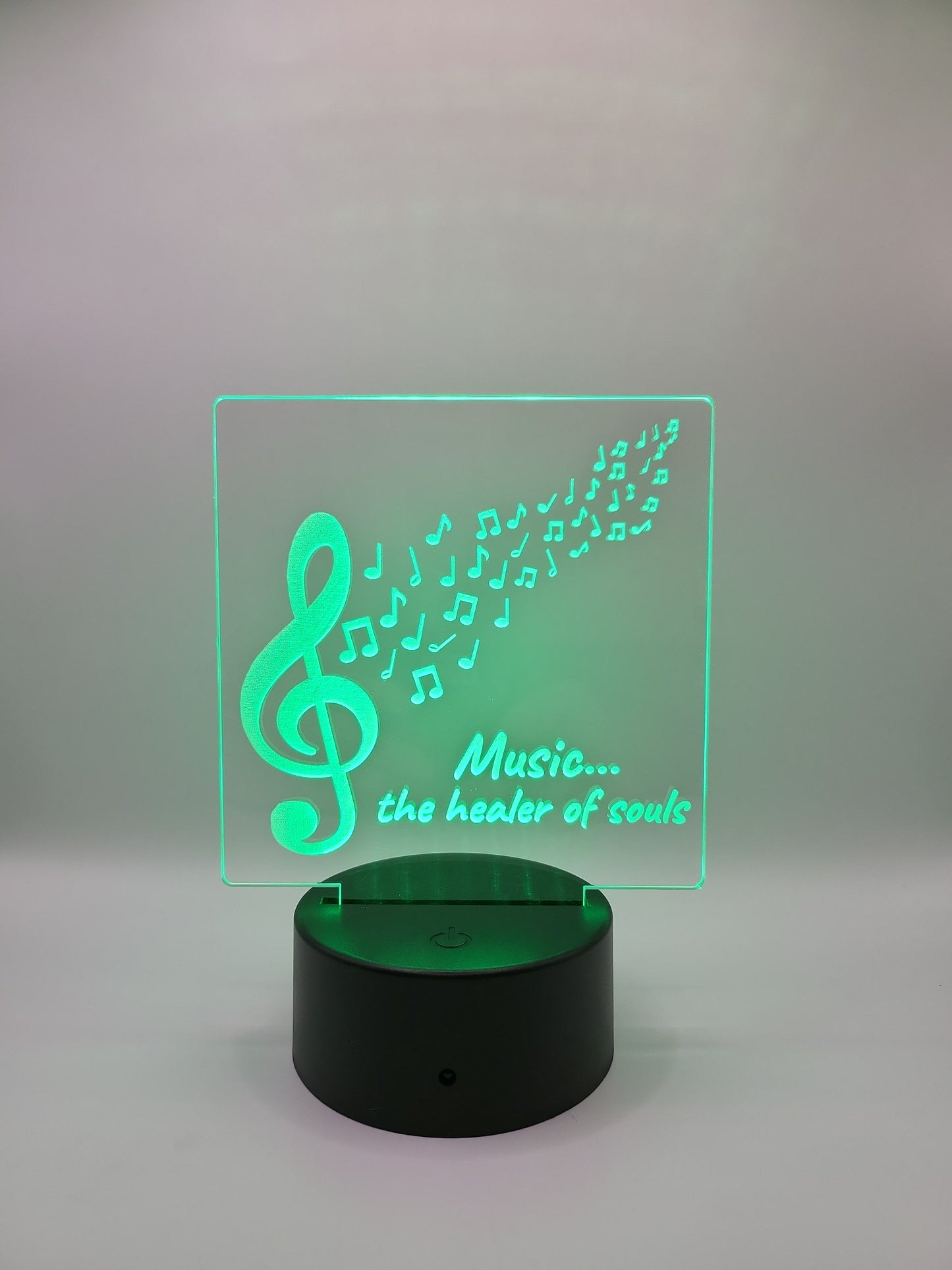 Music, healer of souls acrylic sign, with color-changing light base.