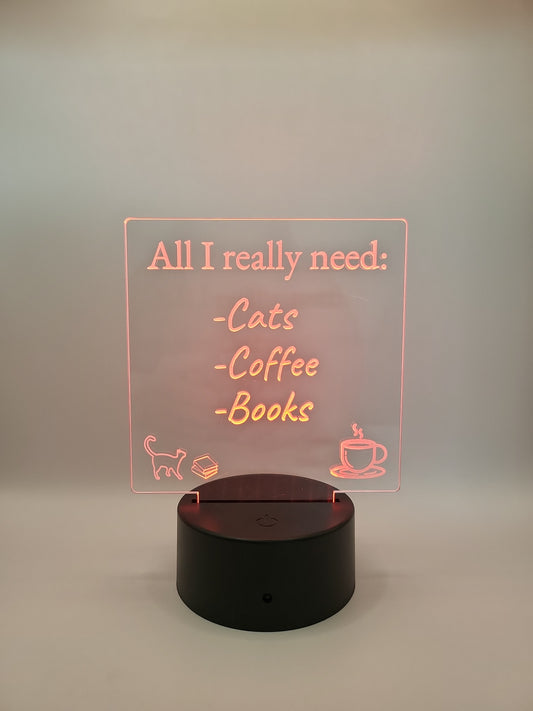 All I Really Need-Cats, Coffee, Books acrylic sign, with color-changing light base.