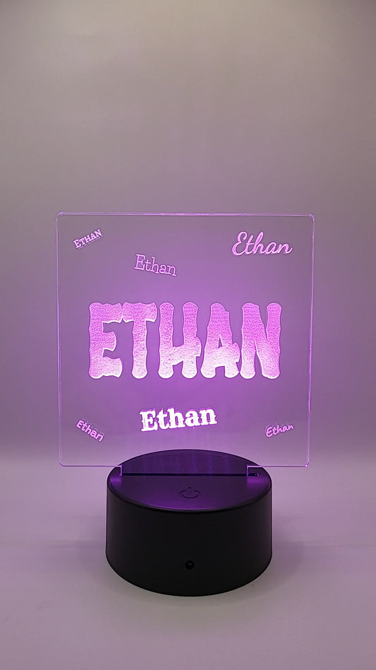 Personalized acrylic sign with color-changing light base